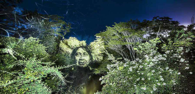 Street Art 2.0 in the Amazon; digital projection on trees of Suri natives by Philippe Echaroux