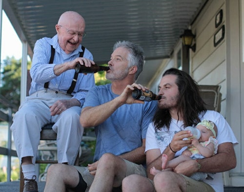 Hilarious picture of four generations sharing a drink